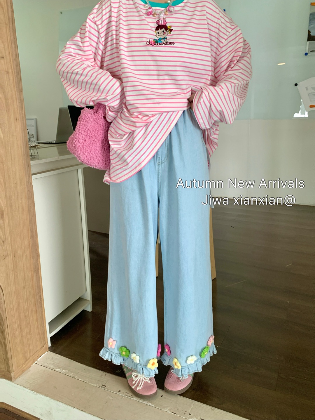 鑫鑫大码女装 早秋新款 百搭松紧腰裤脚花边牛仔裤