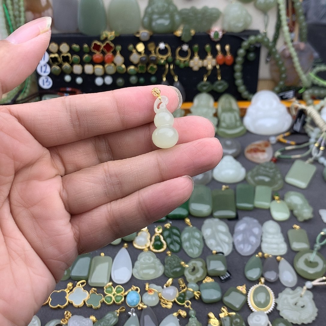 小***使和田玉18K金镶嵌吊坠(不含链)