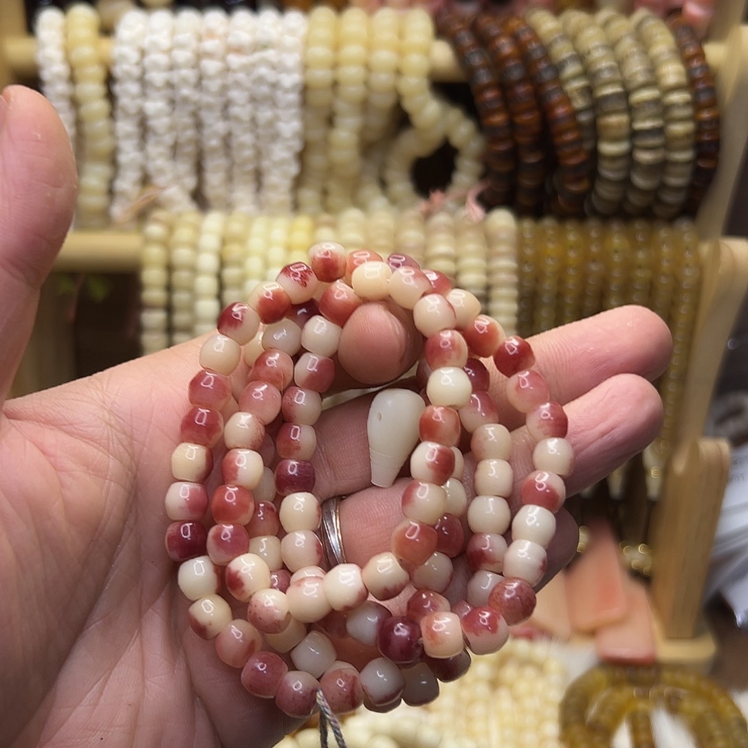 A***a桃核把件紫血驼骨108送三通