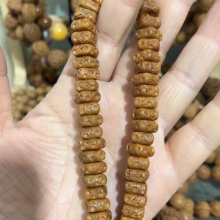 闲***人核桃手串/手链精品桃枭原籽手持