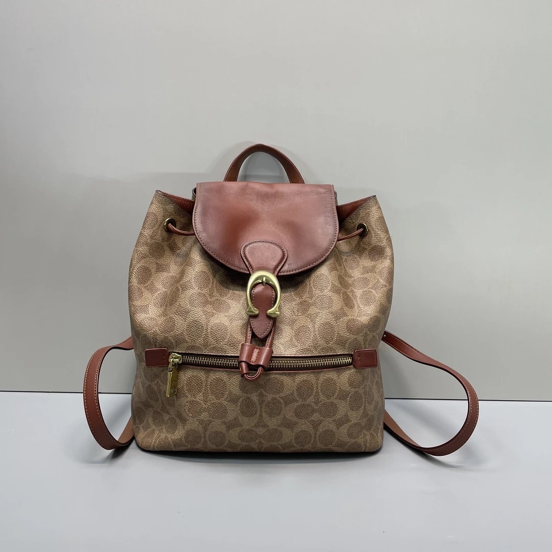 90新 COACH/蔻驰 红棕色双肩包24*28*11cmE031512