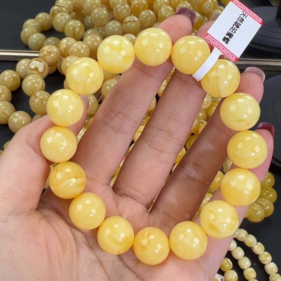 琥珀未镶嵌手链23.2黄白妖花