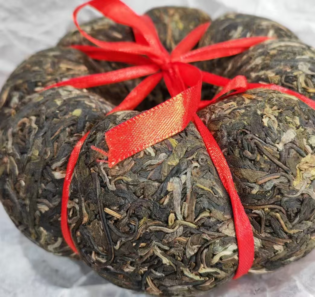 J易武麻黑金瓜（普洱生茶）1000克/沱