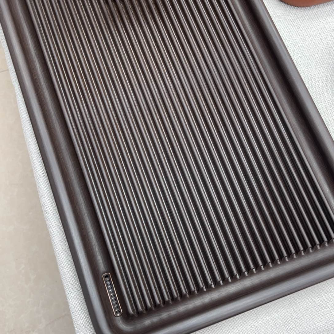 胡**碴50.30.5汉唐棕色油盘