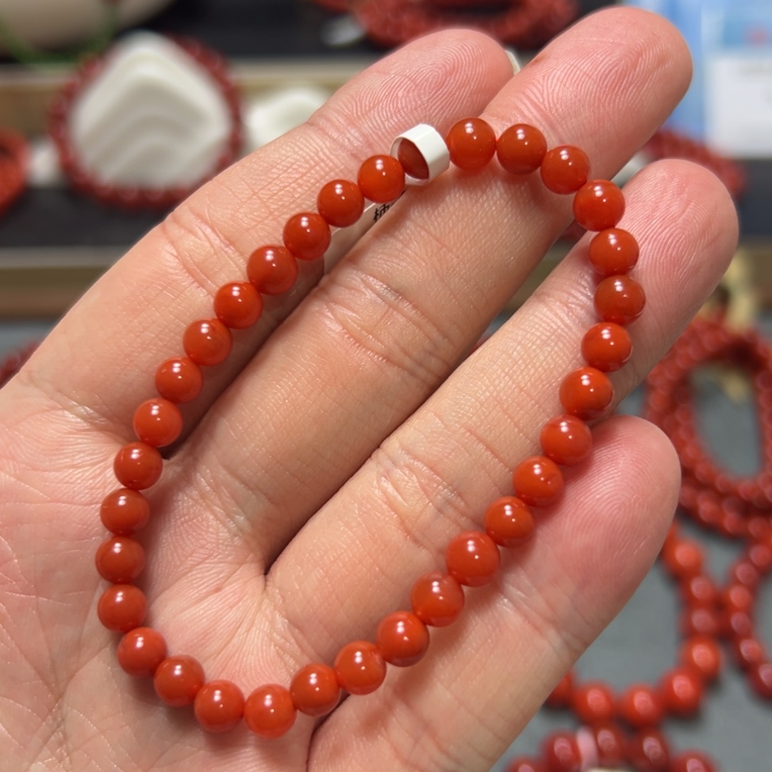 南红玛瑙未镶嵌手串性价比柿子红纯润约5.5mm
