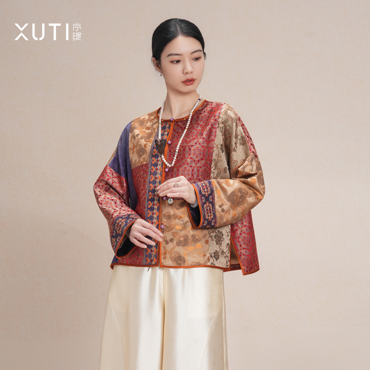 序缇新中式不对称拼接桑蚕丝盘扣上衣女早春新款H116-27592