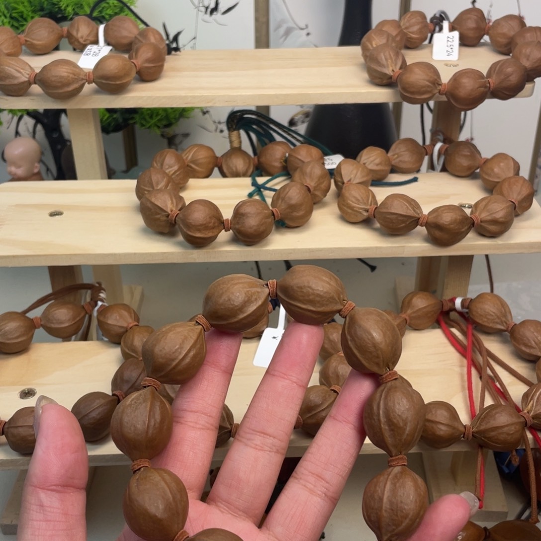 司***达橄榄核手串/手链22*27梅林铁核