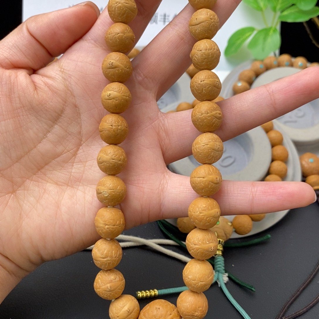 凤眼菩提吊坠12.5手持