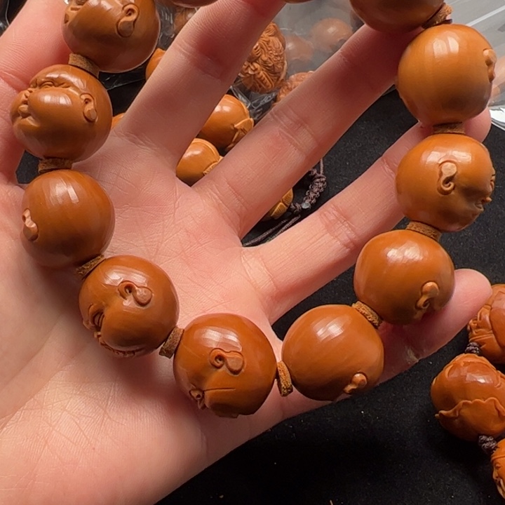 孟***量手串橄榄核21百态