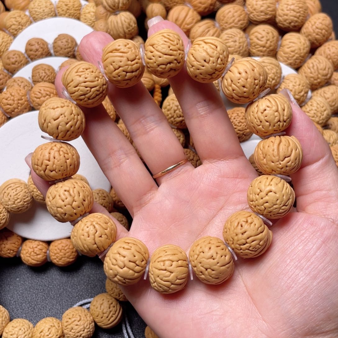 桃核手串镇*肉纹元宝