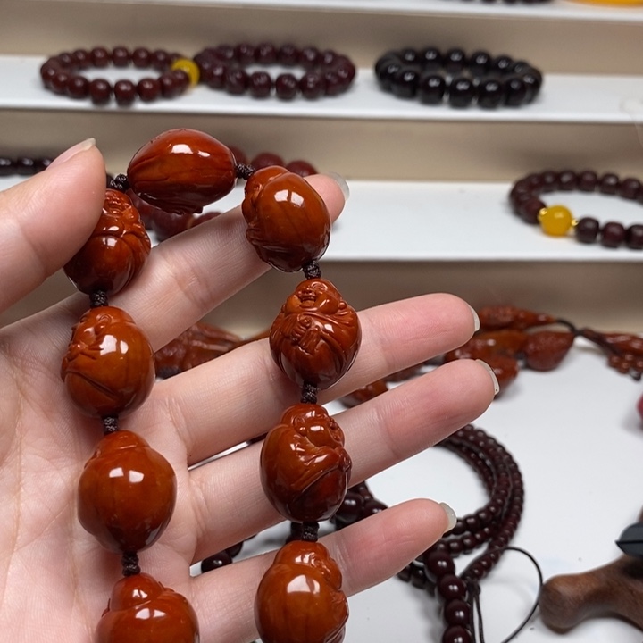 懂***我橄榄核雕刻工艺的发展