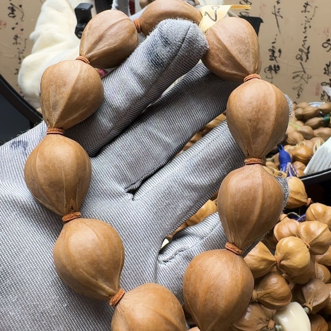 手串橄榄核铁三角