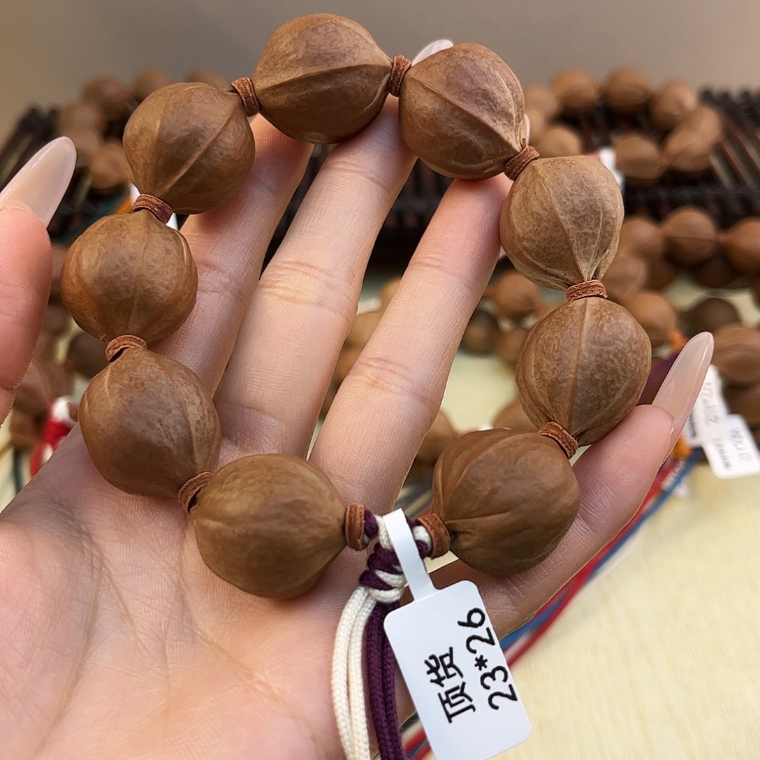 蒲***堂橄榄核吊坠梅林铁核文玩手串