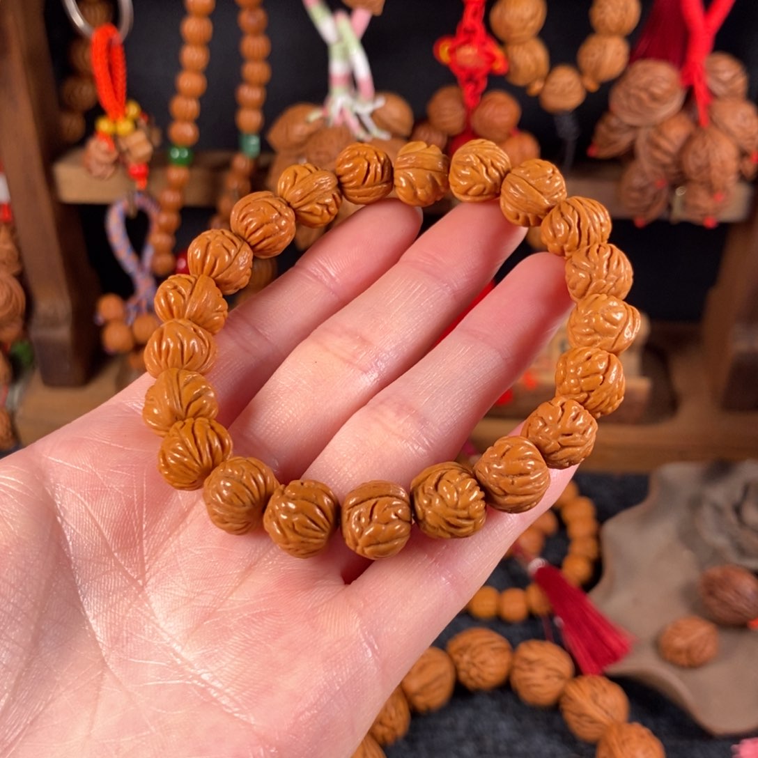 吊坠桃核桃枭手串