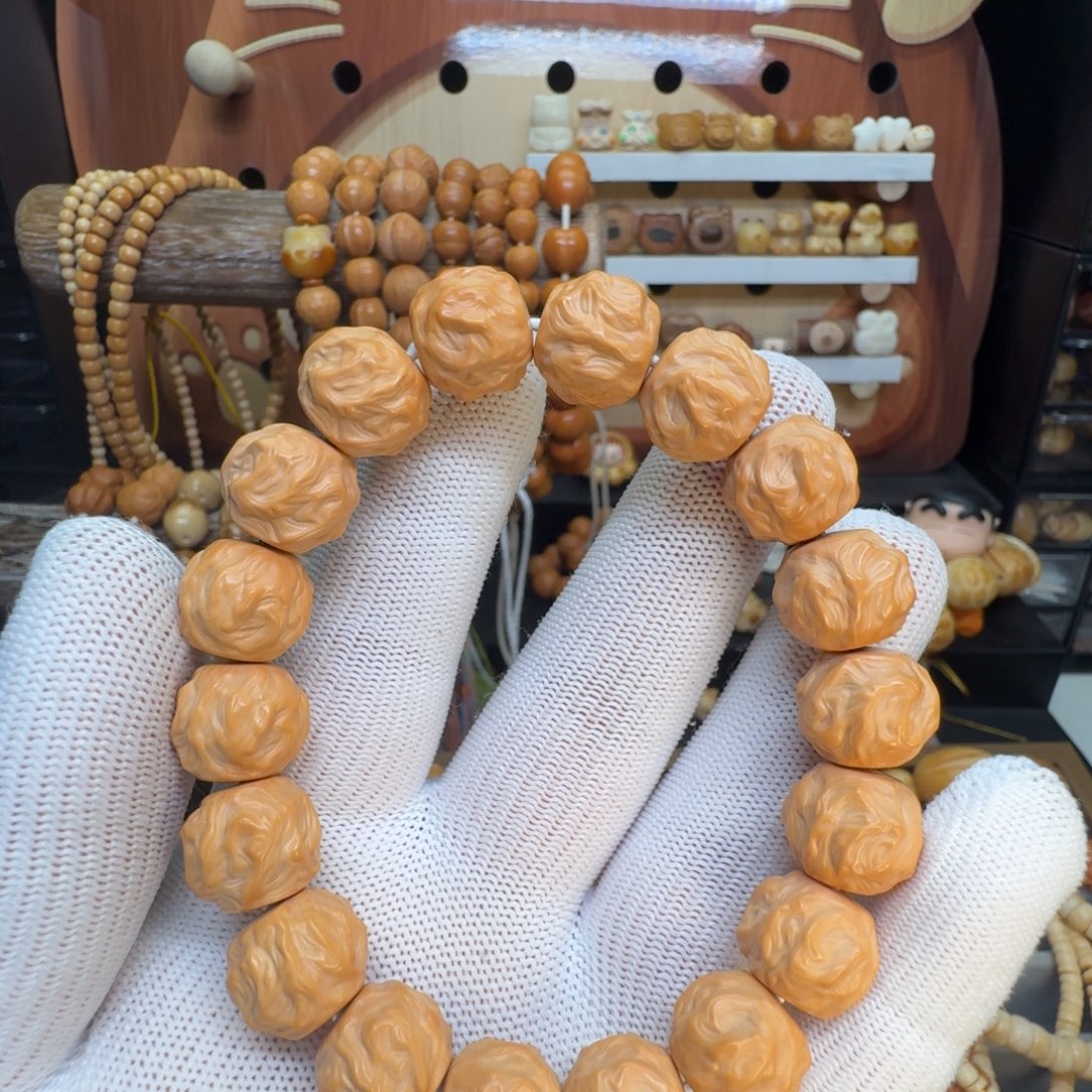 桃核吊坠龙蛇之变