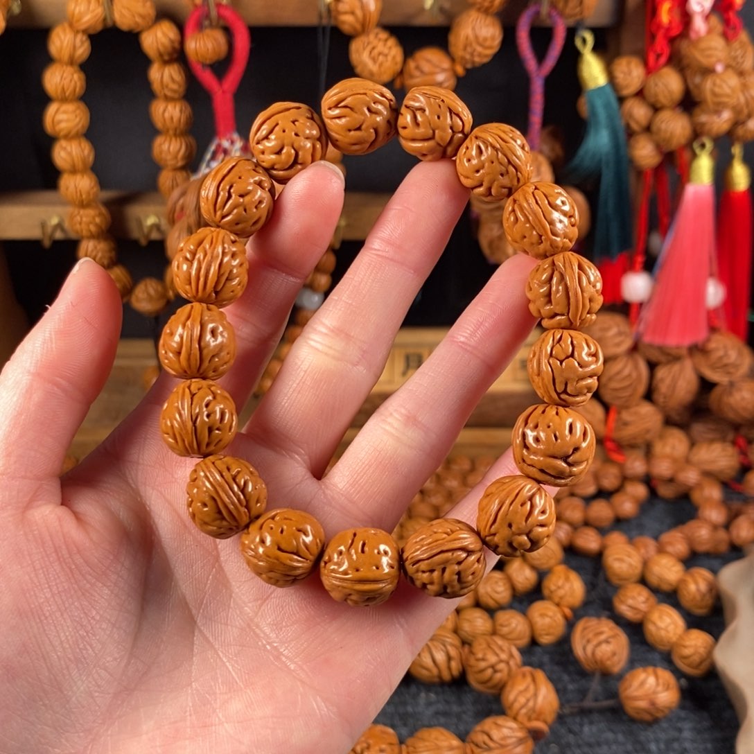 吊坠桃核桃枭手串