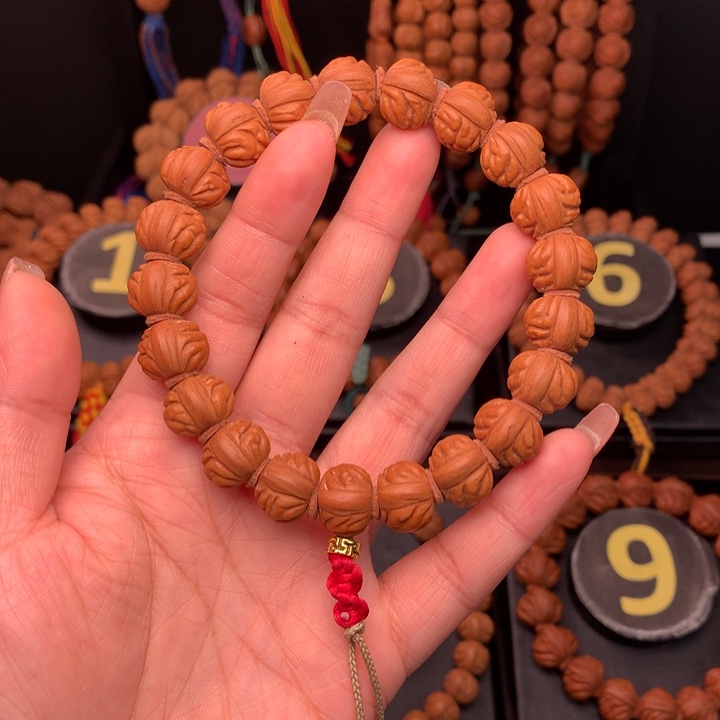 桃核吊坠1.3野生红莲手串