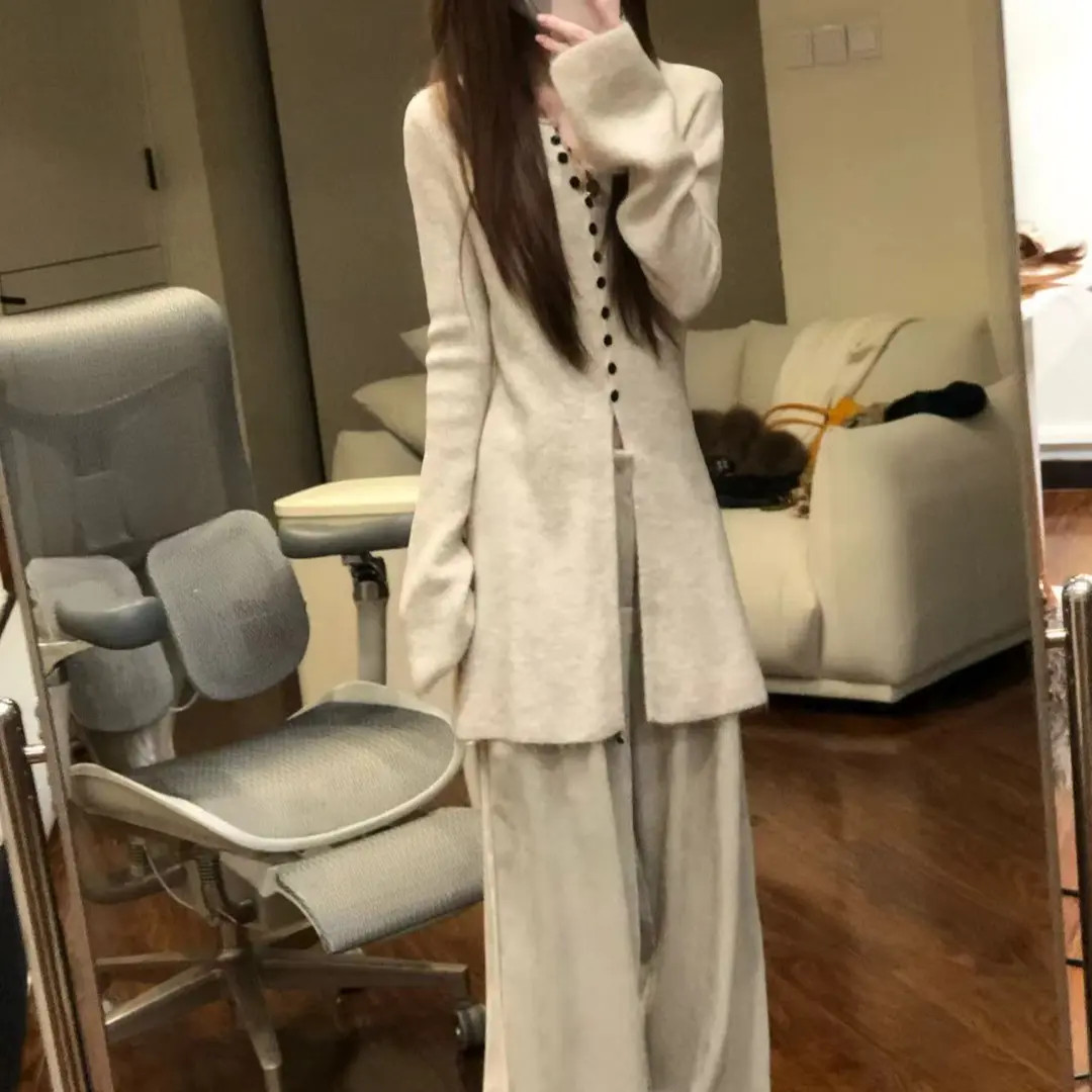 微喇叭袖排扣下针织毛衣显瘦气质网红温柔系上衣开衫时尚中长款