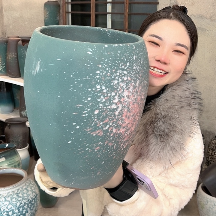 瑕疵口23高32花盆……