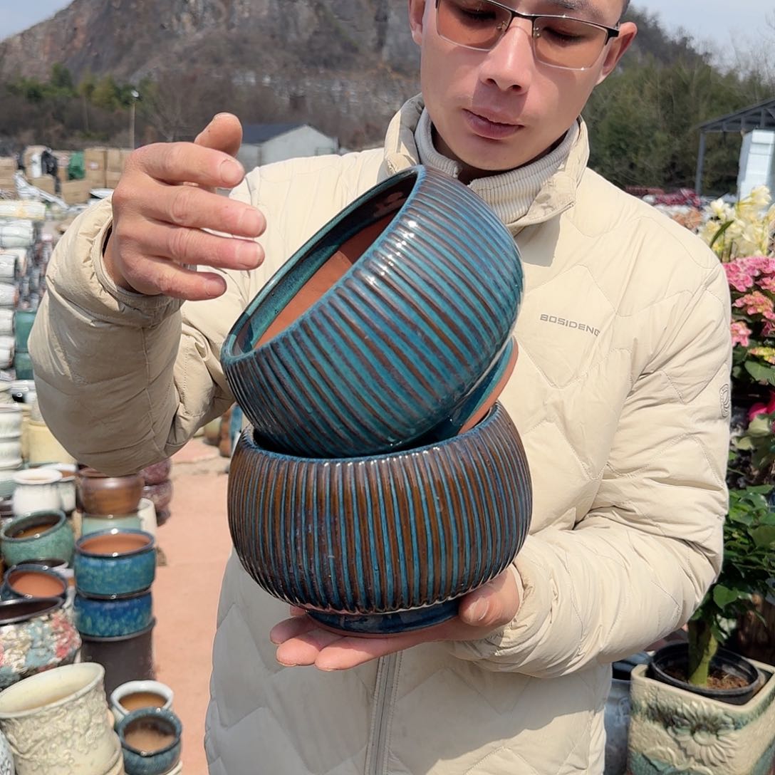 紫砂花盆口16.5高13.5（两个拼竖条