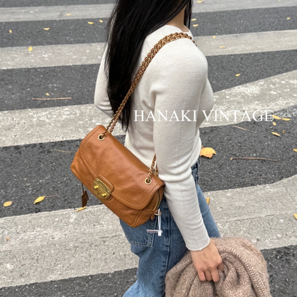 95新 Prada/普拉达 花绮中古/Prada枫叶棕猪鼻子单肩包