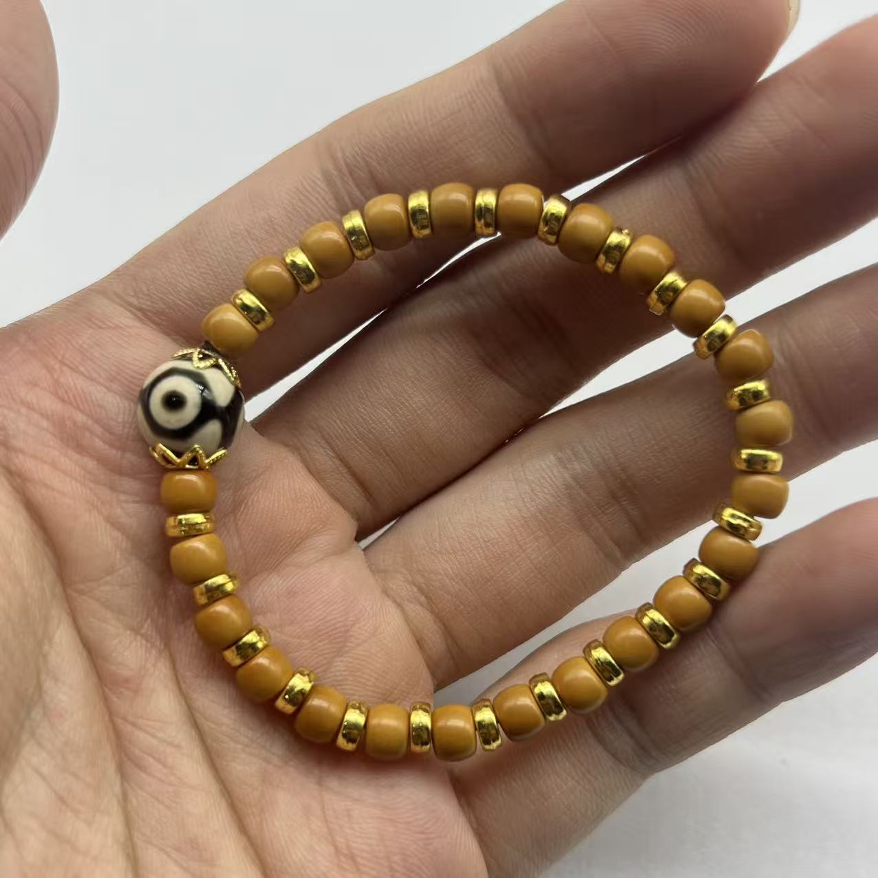 橄榄核尖直切卡4*5单圈手串无礼盒 A592