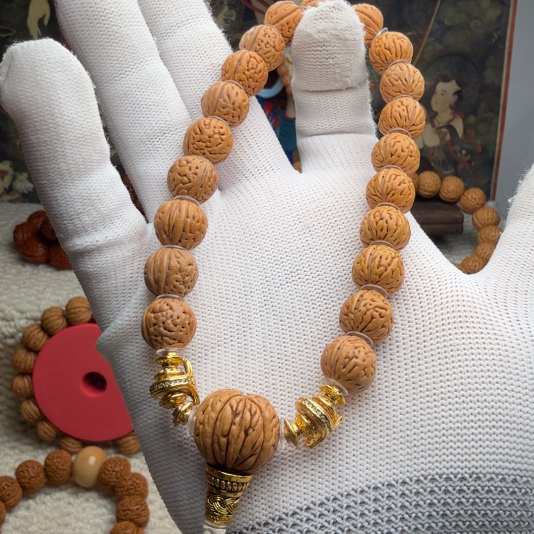 楠***。吊坠桃核野生手串