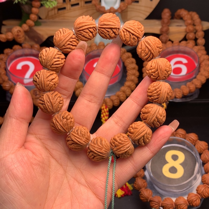 桃核吊坠1.7元宝刺龙手串