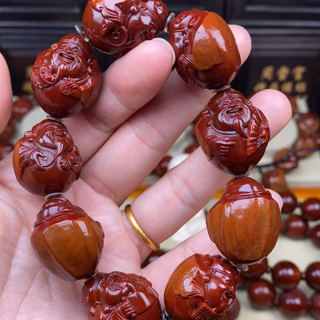 卖***孩橄榄核吊坠财神1111