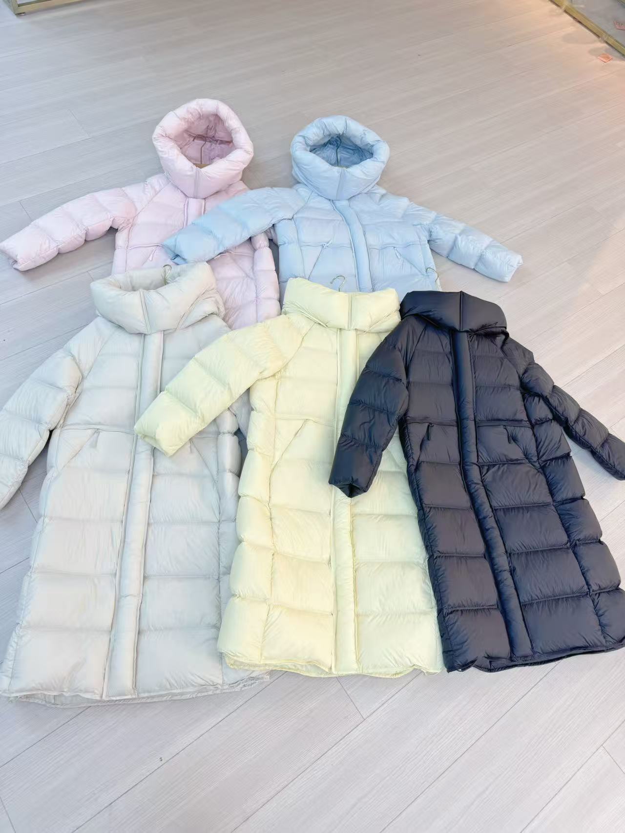 2025新高端90绒羽绒服女长款流行云感泡芙宽松阔版保暖外套5158