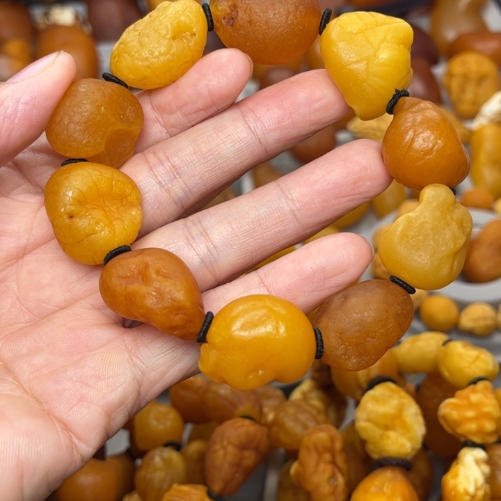 鹏***波琥珀未镶嵌裸石天然蜜蜡手串