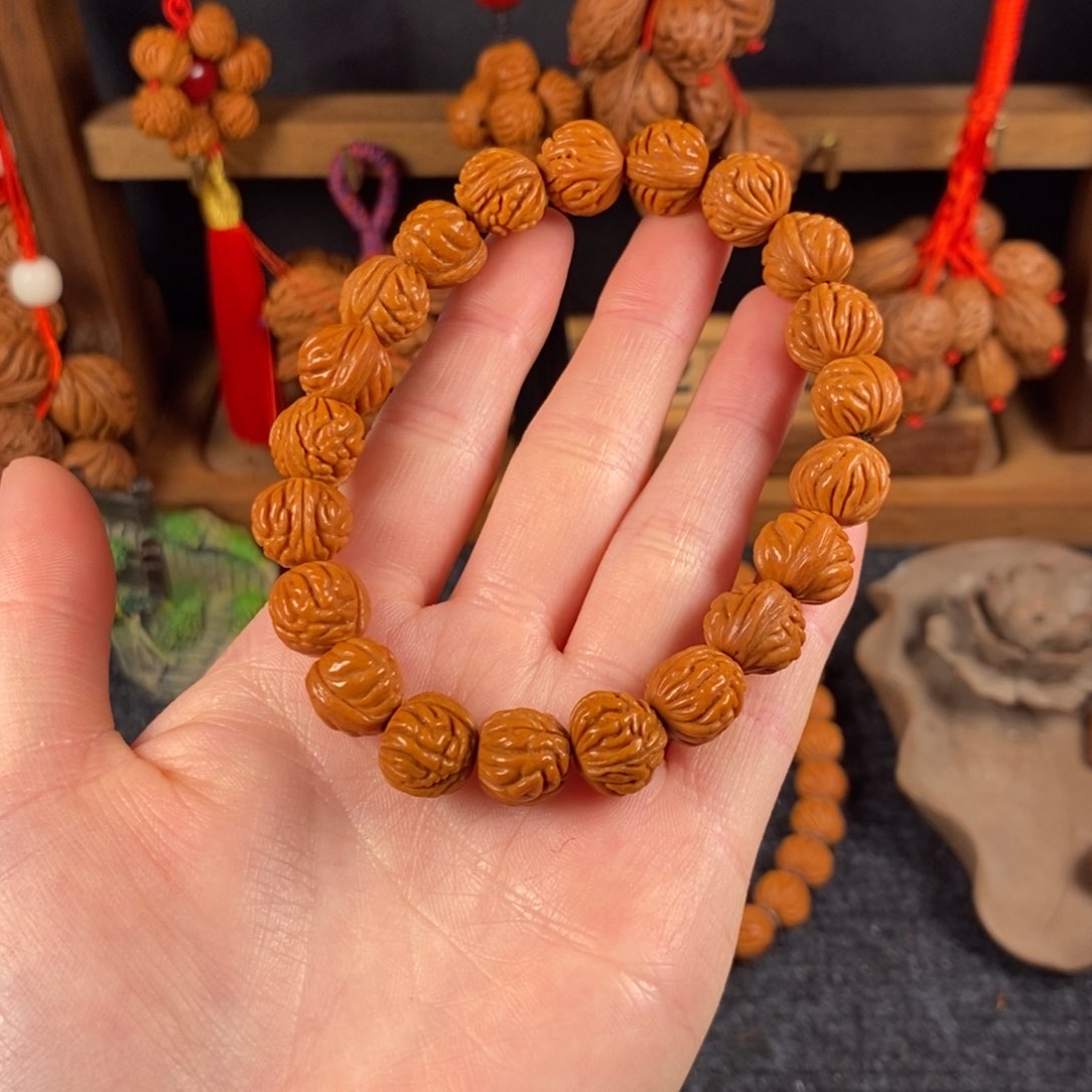 吊坠桃核桃枭手串