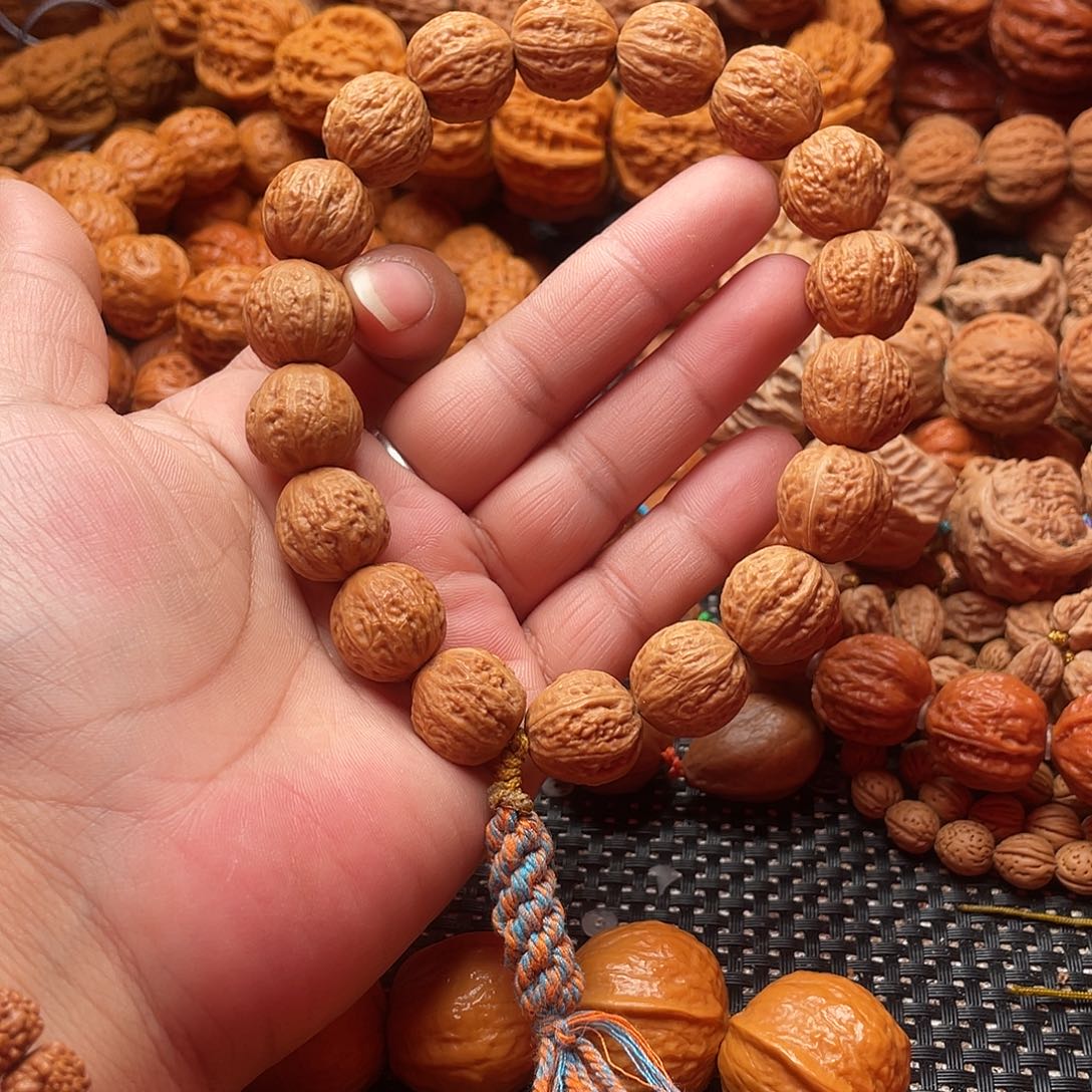 郑***文玩核桃手串金豆子