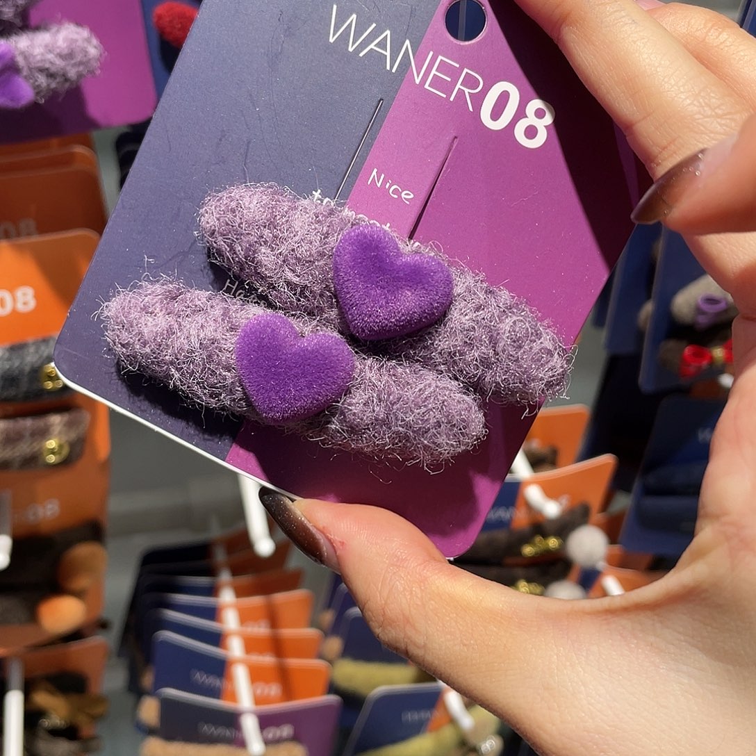 羽毛非金属紫色爱心鸭架