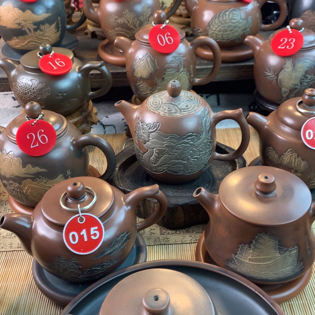 逐**行坭兴陶手工刻绘山水壶