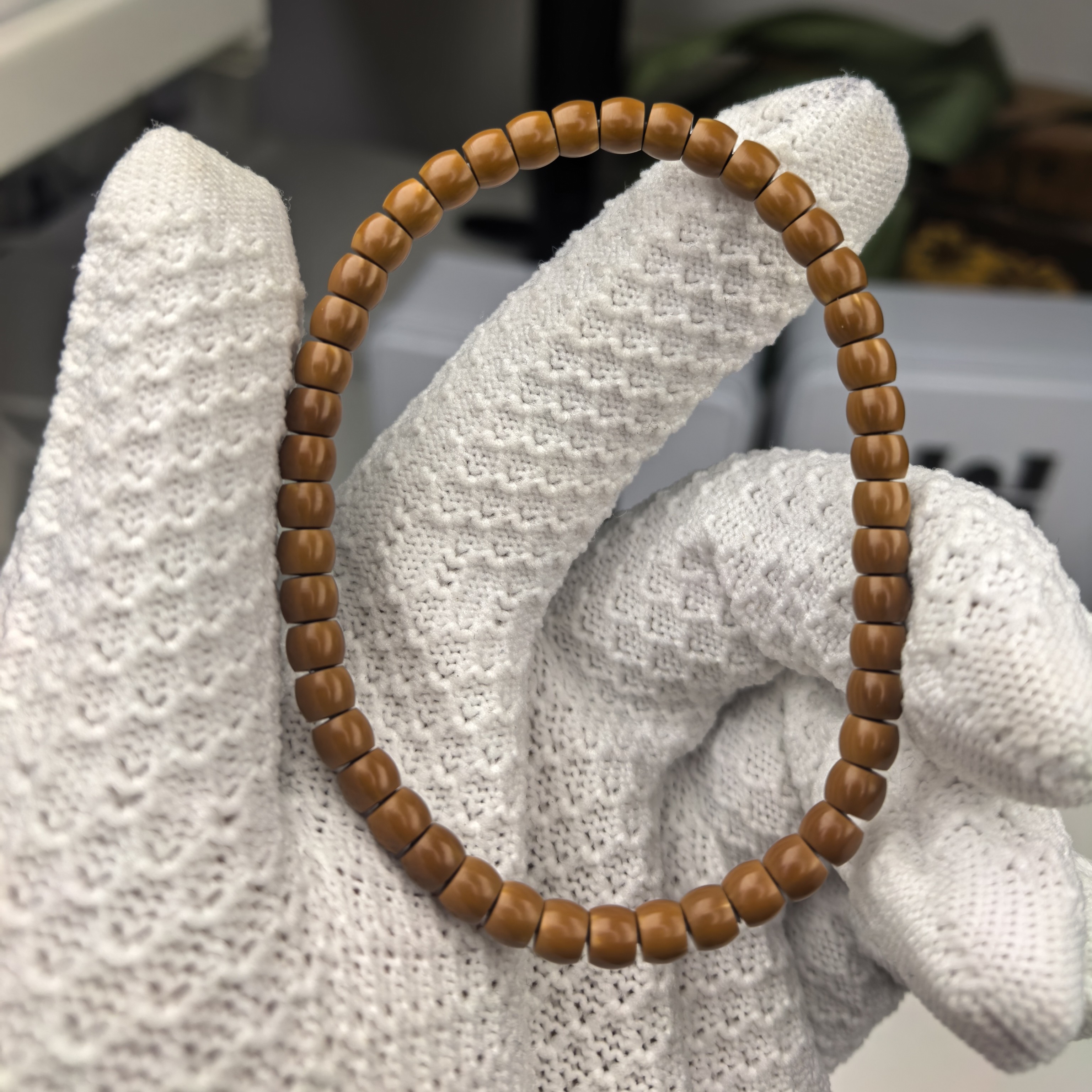 一图一物老挝橄榄核尖5.2直切单圈手串微微白高油性