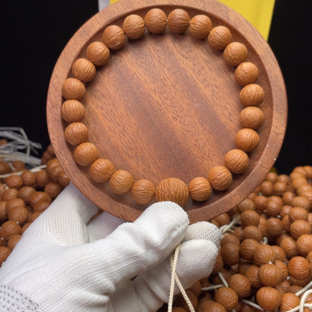 柴***森手串猴头核桃凤羽手持12小