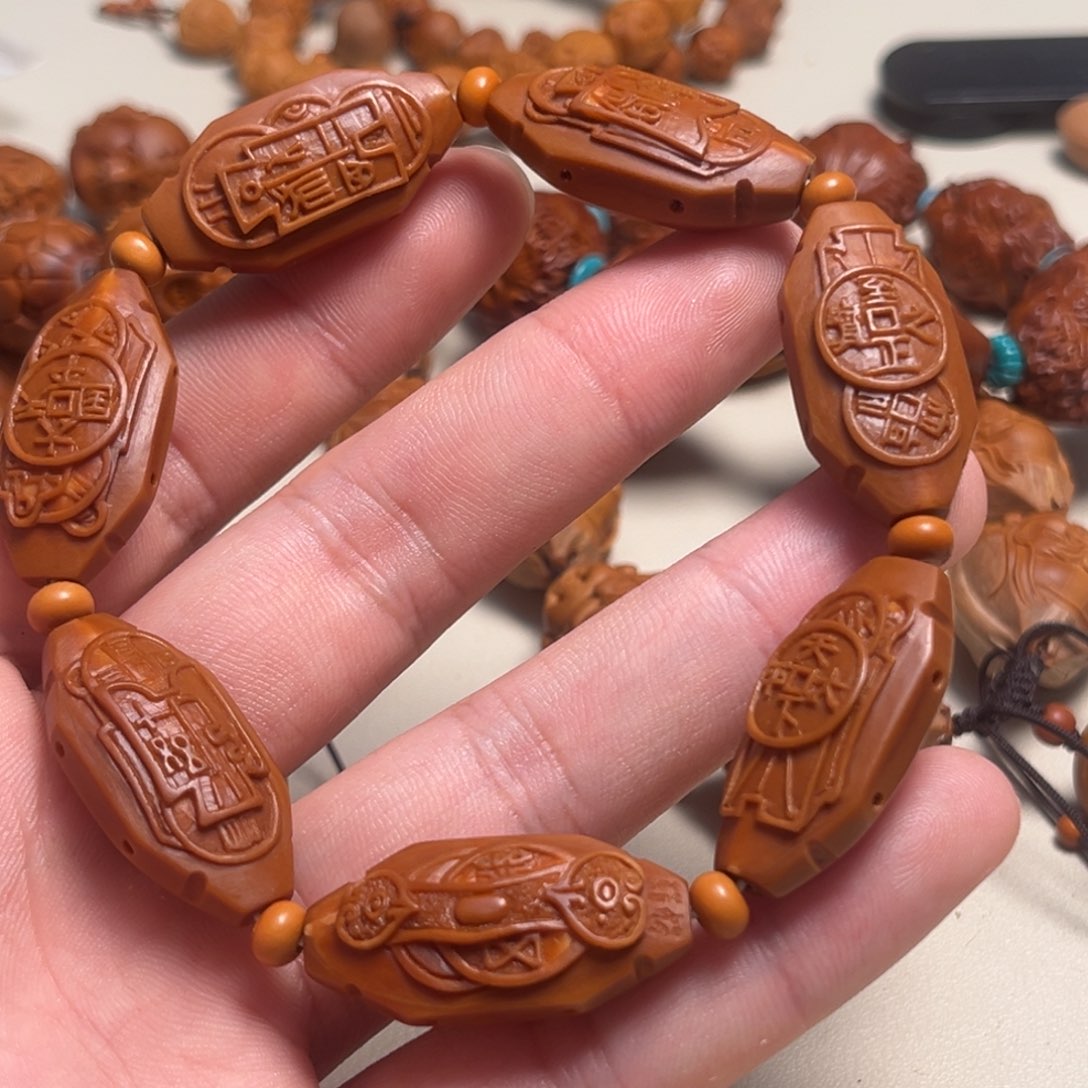 橄榄核吊坠1.5二花财源滚滚