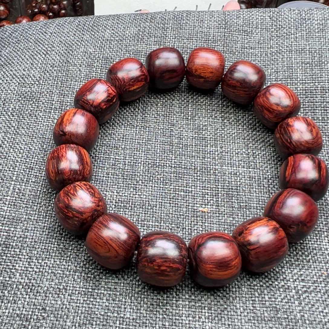 降真香其他海南红降1314鸽血红带火焰纹满结油浮力价