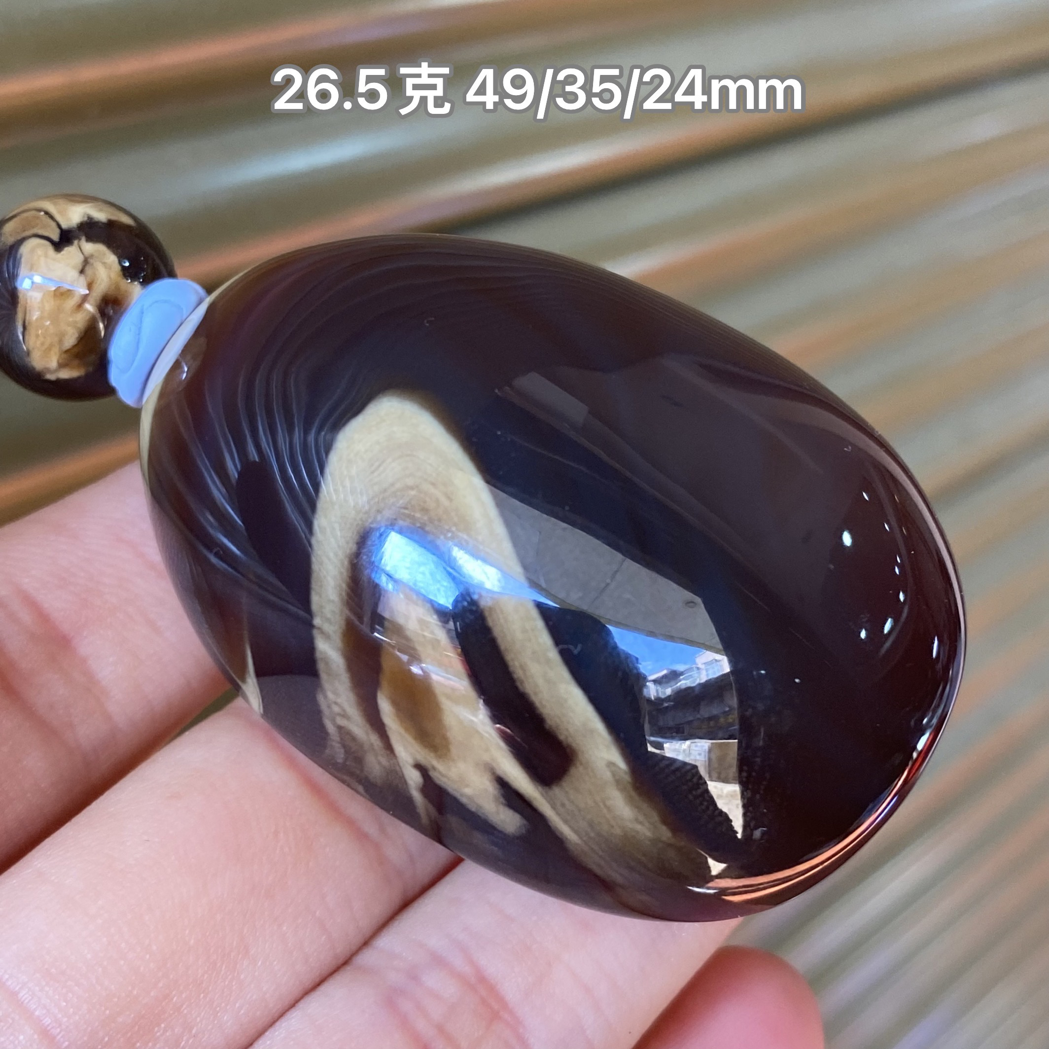 【小伊琥珀】26.5克黑蜜底白蜡溶洞蛋面