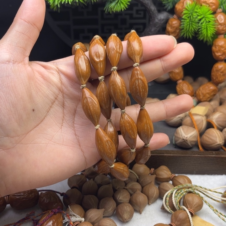 ꧔****橄榄核手串/手链1.0*2.4三花铁核