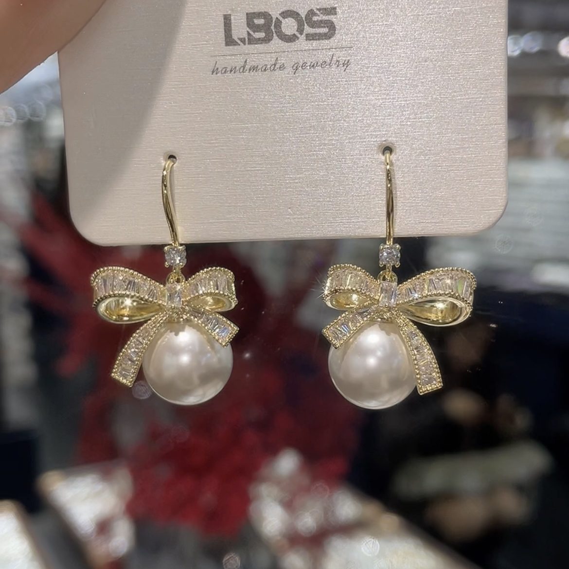 铜合金合成锆石耳饰 蝴蝶结珠珠耳钩气质优雅百搭通勤轻奢时尚