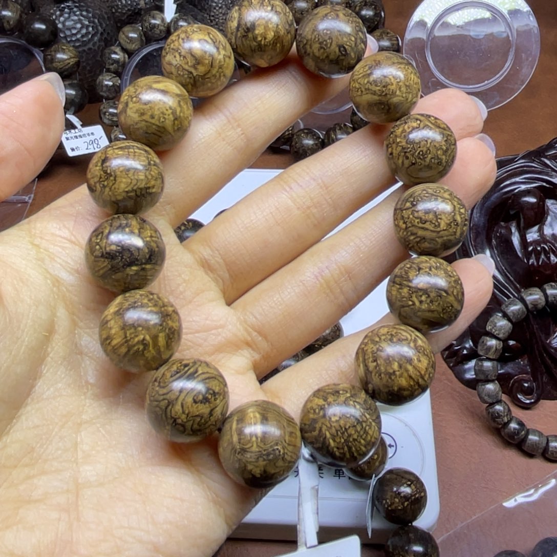 爱***理东非黑黄檀（紫光檀）把件