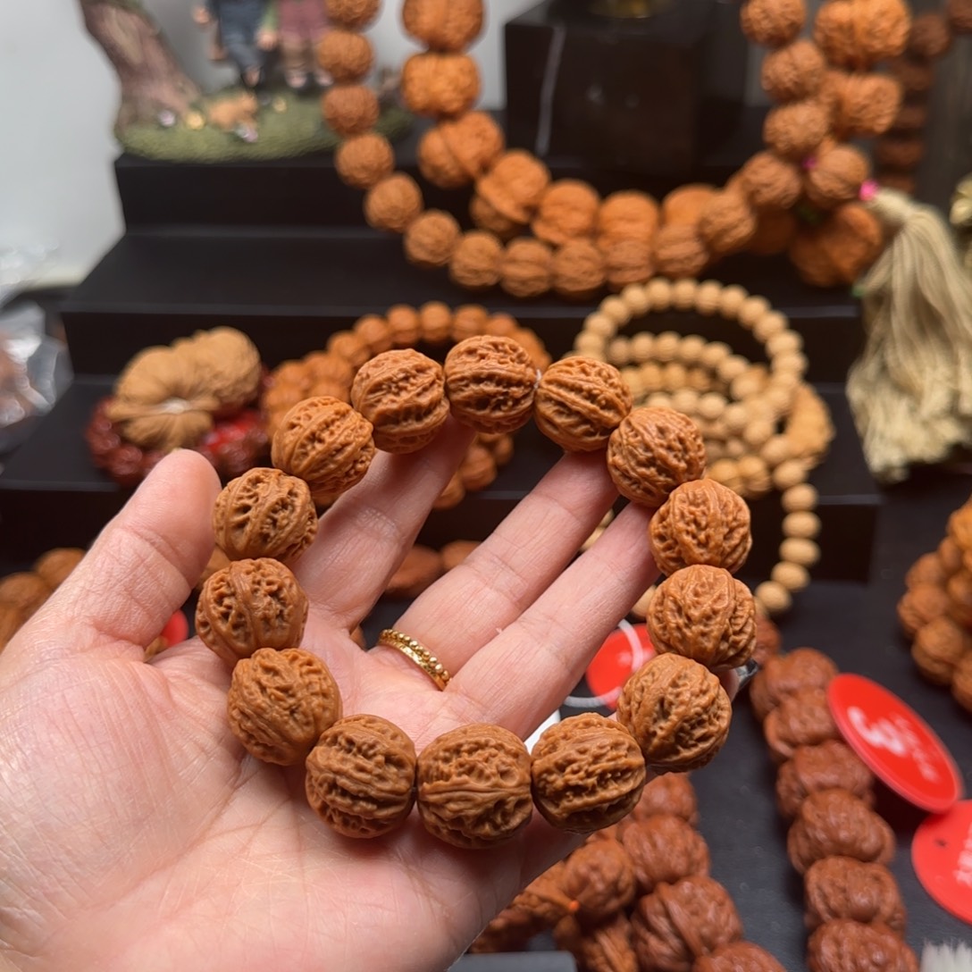 哈***哈吊坠桃核核桃手串