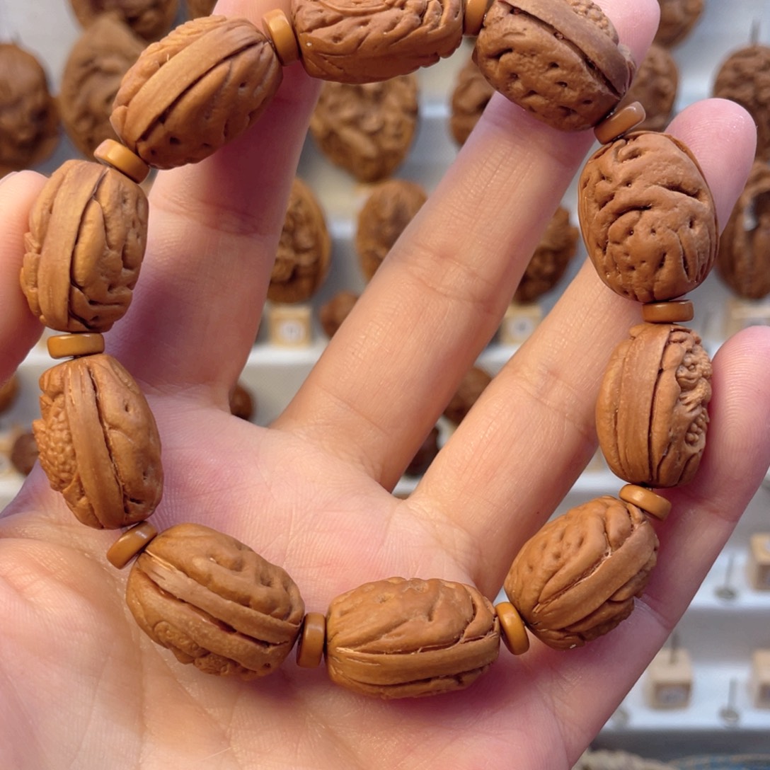 桃核手串野生桃核纯手工雕刻呱呱来财