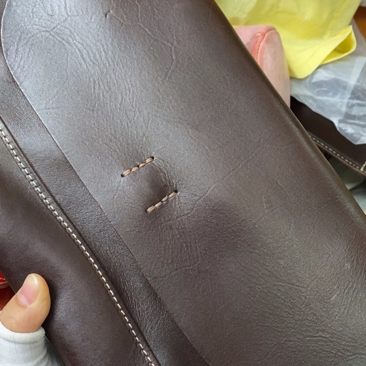 头层牛皮瑕疵单肩包