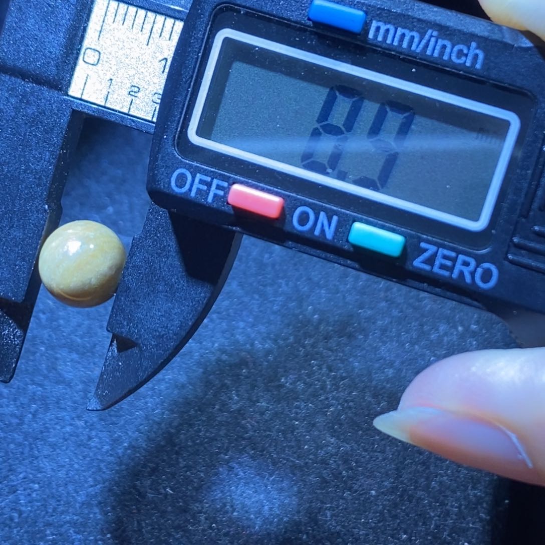 苏***苏未镶嵌琥珀裸石根珀珠8+打1.0孔