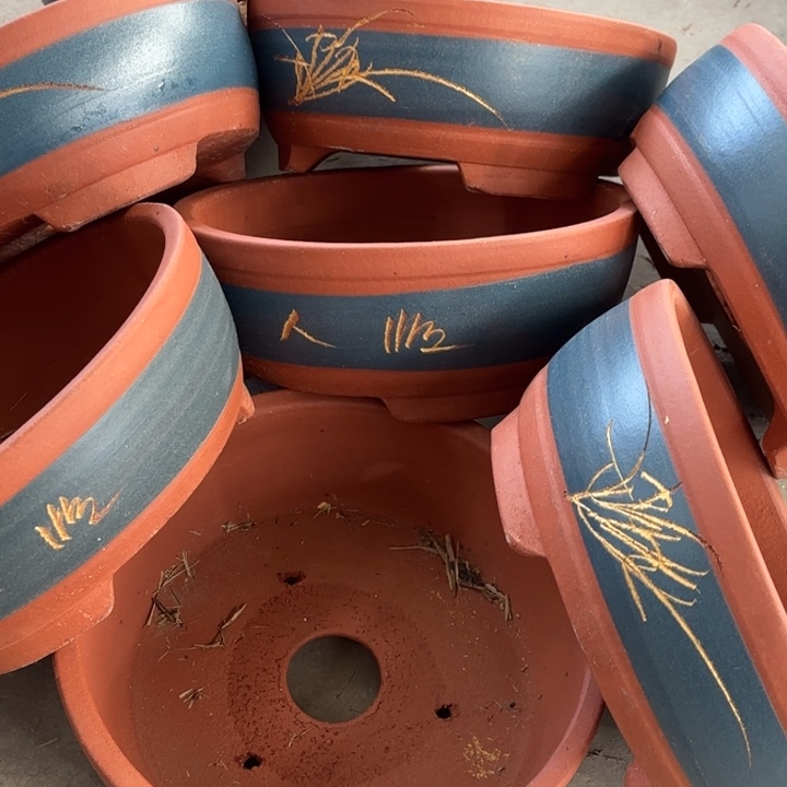 紫砂花盆100-8。                