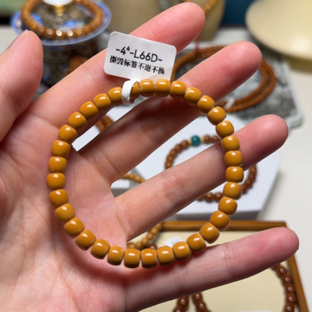 呼***啸橄榄核手串老挝核尖66福利