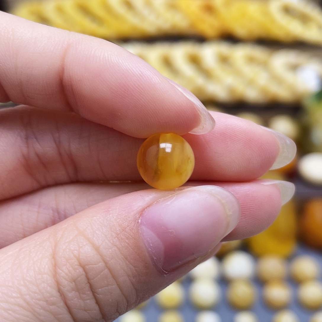 未镶嵌琥珀裸石蜜蜡圆珠9.9mm瑕疵
